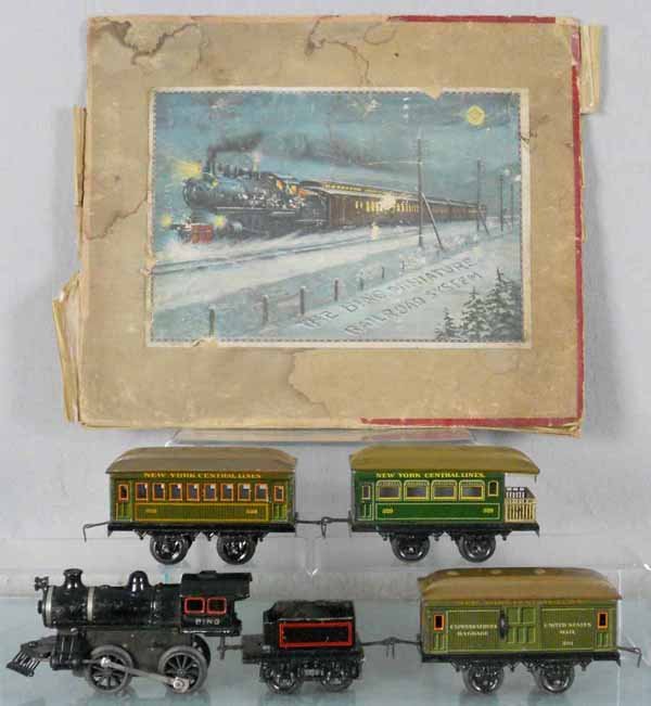 BING TRAIN SET: O ga, cast iron loco, windup working, w/tin tender, 501 baggage, 528 Pullman, 529 obsv, w/some track, orig set box rough, top is missing 2 sides, C7.