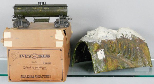 IVES TRAIN LOT: 1 ga, 7849 Texas Oil tank, some touch up spots, missing brakewheel assembly, 105 Tunnel, papier mache, orig box worn & taped, C5-6.