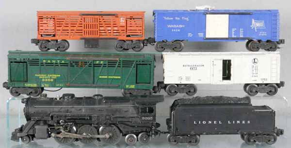 LIONEL TRAIN SET: O ga, 2035 loco, missing 1 headlight jewel, boiler decal chipped, 6466W tender, 3356 horse car, 6472 reefer, 1 door broken, 3656 stock, 3424 brakeman car, oxidation on base, C5.