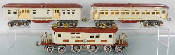 IVES TRAIN SET: O ga, 1694 loco, touched up on roof edge, 1 coupler broken, 1696 baggage, missing 1 coupler, 1695 Pullman, both cars have oxidation spots on roofs, rubberstamping worn, this is an orig issue train - n