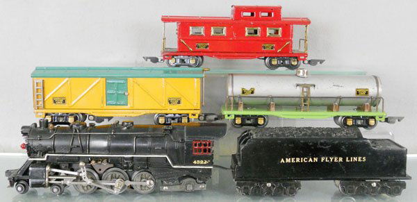 AMERICAN FLYER TRAIN SET: O ga, loco has repaired cab windows, touch up around numberboards, 1681 tender, 408 box car, 410 tank, 411 caboose, all cars have decal chips, C5-6.