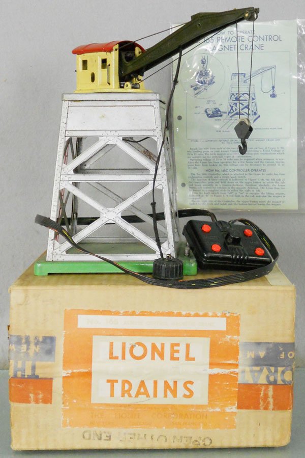 LIONEL 165 MAGNETIC CRANE: O ga, minor surface oxidation spots on superstructure, orig box minor wear, C5-6.