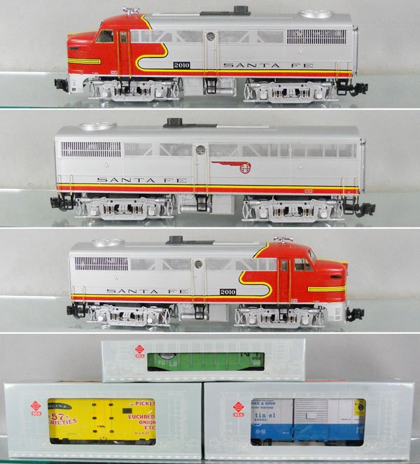 REA ARISTOCRAFT SANTA FE TRAIN SET: G ga, 2 #22010 A units, 22060 B unit, w/cars 41002 gondola, 46204 reefer, 46003 box car, orig boxes & inserts minor wear, boxes not shown in photo, C9. Property of the Stong Museum