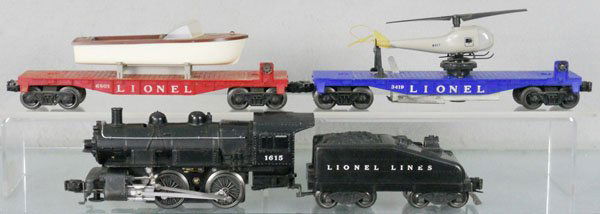 LIONEL TRAIN SET: O ga, 1615 Switcher, 1615T tender, 6801 flat car w/boat, 3419 operating helicopter car, 2 struts broken, C6.