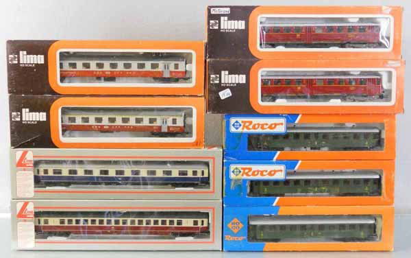 9 LIMA & ROCO PASSENGER CARS: HO ga, Roco 3 #44466, Lima 309165K, 309168K, 8037L, 9125, 2 #9316, orig boxes, 4 minor wear, 3 have some tape, C9.