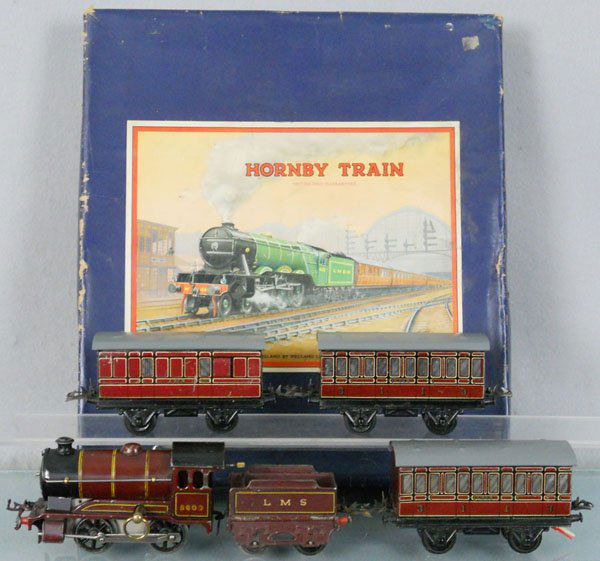 HORNBY 501 PASSENGER TRAIN SET: O ga, 5600 LMS loco & tender, windup working, w/3 passenger cars, w/track, orig box & insert some wear, C5.