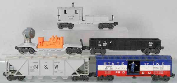 5 LIONEL FREIGHT CARS: O ga, 6446 cement car, 3494-275 State of Maine box car, 3620 searchlight, 6462 gondola, 6419 work caboose, 3 orig boxes only, boxes worn & not shown in photo, C5-6.