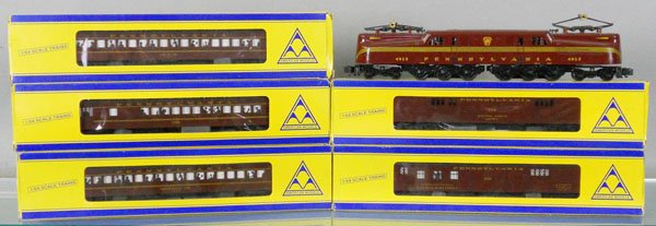 AMERICAN MODELS PRR GG1 TRAIN SET: S ga, red w/5 stripes, w/post, baggage, combine, coach & obsv, orig boxes & inserts minor wear, C8-9.
