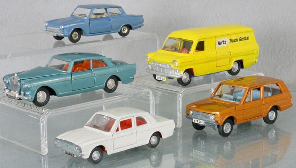 5 DINKY VEHICLES: 159 Ford Cortina, 192 Range Rover, 127 Rolls Royce Silver Cloud, some wear to front grille at license plate, missing small trim piece on bumper, 407 Hertz Van, 139 Ford Cortina, C5-8.
