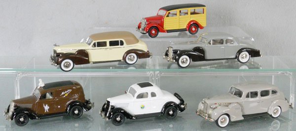 6 REX TOYS: die cast, 35 Ford Woody, 2 #38 Cadillacs, w/added trim, 35 Ford Michelin, 35 Ford Police, 40 Packard, C7-9.