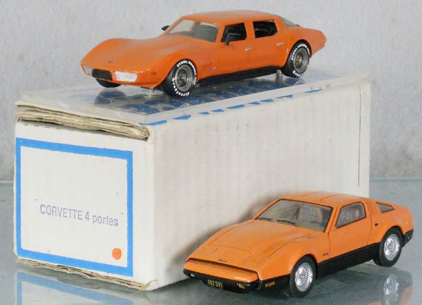 2 RESIN RACE CARS: Provence Moulage Corvette Stingray, orange, mounted on plastic, orig box & insert, unmarked Bricklin SV1, orange, C8-9.