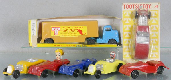 7 TOOTSIETOY VEHICLES: 217 Mexican Truck, orig box worn, 3 Hot Rods, 1 sealed on orig card, 3 MG TF, C5-9.