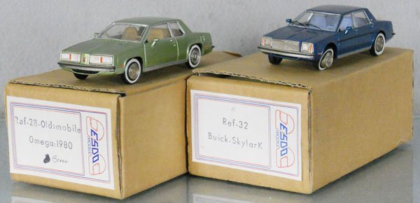 2 ESDO MODELES AUTOS: resin, 28 1980 Oldsmobile Omega, missing 1 tire, 32 Buick Skylark, orig boxes & inserts, C8-9.