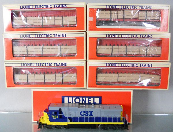 LIONEL CSX TRAIN SET: O ga, 18215 diesel loco, w/horn, 6 #16381 flat cars, orig boxes minor wear, C9-10.