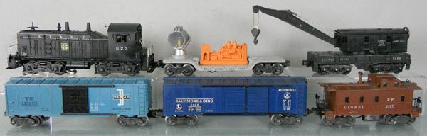 LIONEL TRAIN SET: O ga, 623 switcher, 1 side has decal chip, 3520 searchlight car, missing 1 step & brakewheel, 2460 crane, 6464-475 B&M box car, 6468 B&O box car, 2357 caboose, C5-6.