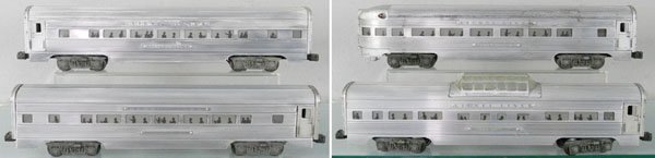 4 LIONEL PASSENGER CARS: O ga, 2534 Silver Bluff Pullman, 2533 Silver Cloud Pullman, 2532 Silver Range vista dome, 2531 Silver Dawn obsv, cars have repainted bottoms, tops of cars have some corrosion, cleaned using a wire whe