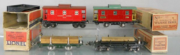 4 LIONEL FREIGHT CARS: O ga, 2657 caboose, 807 caboose, 831 lumber, 3651 log, orig boxes worn, 2 rough, C5-6.