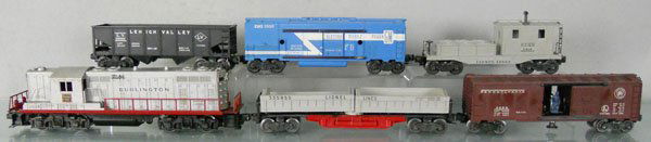 LIONEL TRAIN SET: O ga, 2328 Burlington GP9, 1 end has a screw crack, frame repainted, 3359 dump car, 3484 PRR box car, steps chipped, 6456 LV hopper, 3530 generator car, 6419 work caboose, C5-6.