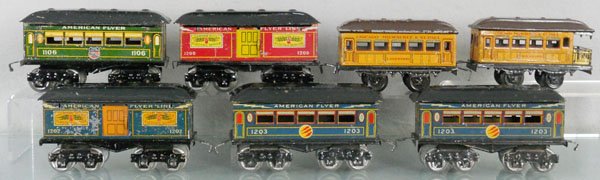 7 AMERICAN FLYER & BING PASSENGER CARS: O ga, American Flyer 1200 baggage, 1202 baggage, some lithography flaking, 2 #1203 coaches, 1106 UP coach, Bing Lakewood coach & Rockford obsv, C4-6.