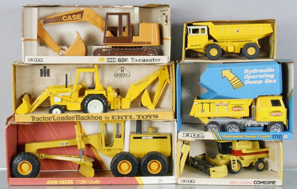 6 ERTL VEHICLES: 637 Excavator, 425 Dump Truck, 472 Tractor, 3419 Dump Truck, 511 Grader, 375 Combine, die cast & pressed steel, orig boxes minor wear, C8-9.