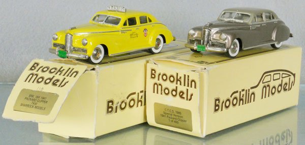 2 BROOKLIN MODELS PACKARDS: white metal, 1941 Clipper Taxi, 1941 Clipper Sedan, orig boxes minor wear, 1 incom, C8-9.