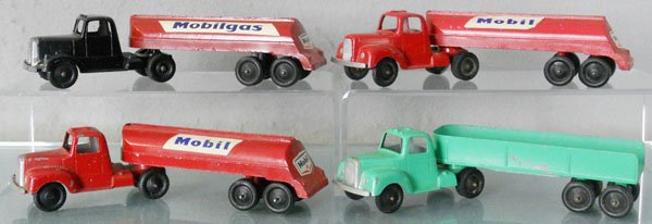 4 TOOTSIETOY MACK TRUCKS: 3 Mobil Tankers, missing 1 sticker, Machinery Hauler, C5-6.
