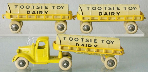 TOOTSIETOY 192 DAIRY SET: yellow Mack w/3 trailers, C6-7.