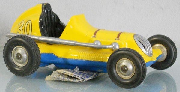 COX THIMBLE DROME RACER TETHER CAR: die cast, 9 1/2" long, some wear on chassis from use, w/worn cellophane instruction sheet, C6-7.