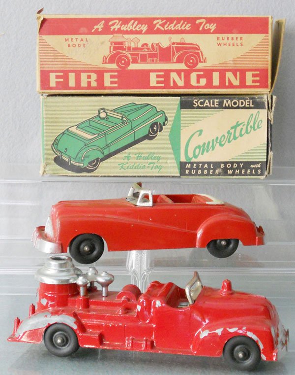 2 HUBLEY KIDDIE TOY VEHICLES: painted die cast, 464 Fire Engine, heavy paint flaking on 1 side, 7 1/2" long, 458 Convertible, 7" long, orig boxes rough, 464 is C5-6, 458 is C7-8.