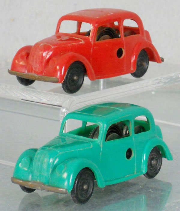 2 MINIC 94M MORRIS SALOONS: both are plastic, windups working, C5-6.