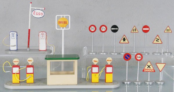 DINKY ACCESSORIES: 12 Road Signs, from various sets, 785 Shell Petrol Pump Station, 49D Esso Gas Pumps, C7-9.
