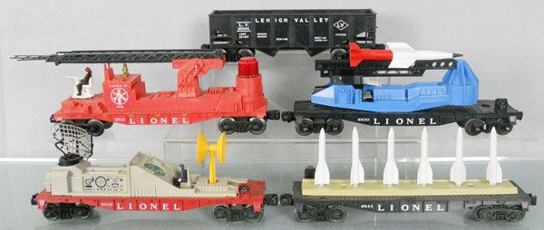 5 LIONEL FREIGHT CARS: O ga, 6076 LV hopper, 3512 fire & ladder car, 4 steps broken, 6630 missile launching car, 3540 operating radar car, 6844 missile carrying car, C5-8.