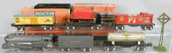 LIONEL TRAIN SET: O ga, 1688E loco, 2689T tender, 2680 tank, 2679 box car, 3659 dump, 2682 caboose, 68 sign, set has oxidation & litho wear spots, orig boxes worn, C4.