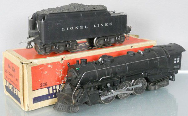 LIONEL 226E LOCO & TENDER: O ga, 226E loco, missing 1 boiler jewel, orig box rough, 2226W tender, drawbar replaced, C7-8.