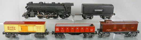 LIONEL TRAIN SET: O ga, 1666 loco, 2689TX tender, 2679 Baby Ruth, 2677 gondola, 2682 caboose, surface oxidation on 1 side, C5.