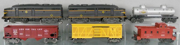 LIONEL 1467W TRAIN SET: O ga, 2032 Erie Alco AA diesels, both have cracks on rear, restored, 6465 tank, 6656 stock, 6456 hopper, 6357 caboose, orig boxes & set box minor wear, C5-7.