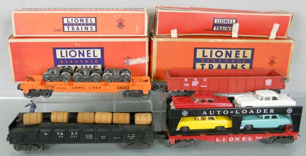 4 LIONEL FREIGHT CARS: O ga, 6362 truck car, 6462 gondola, 3562-21 barrel car, 6414 auto loader, orig boxes minor wear & tape, C7-8.