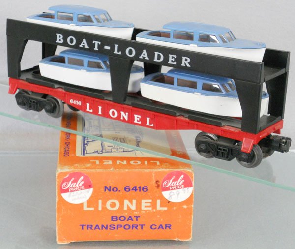 LIONEL 6416 BOAT TRANSPORT CAR: O ga, w/4 orig boats, orig box minor wear & 1 end taped, C9.