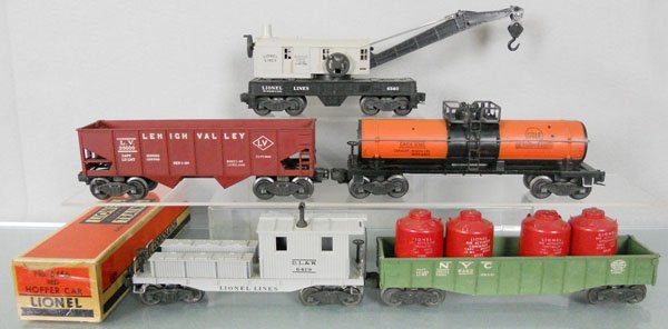 5 LIONEL FREIGHT CARS: O ga, 6560 crane car, 6456 LV hopper, orig box, taped on 1 end, 6315 Gulf tank, 6419 work caboose, 6462 gondola w/canisters, C6-7.