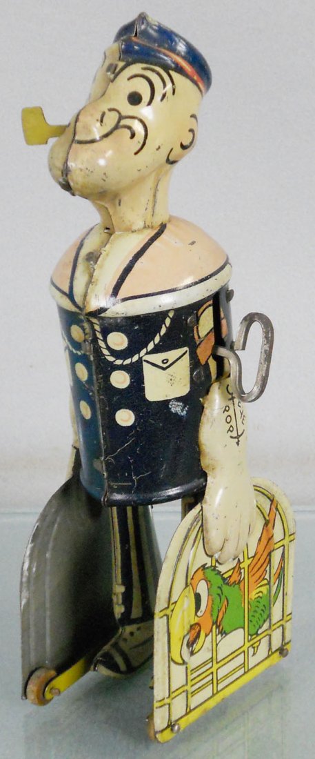 MARX POPEYE & PARROTS: litho tin, windup working, 8 1/4" tall, litho is faded, C6.