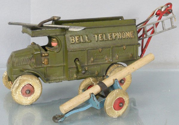 HUBLEY BELL TELEPHONE TRUCK: painted cast iron, 10" long, rubber tires worn, w/trailer, boom & 2 tools, 2 ladders are repros, C5.