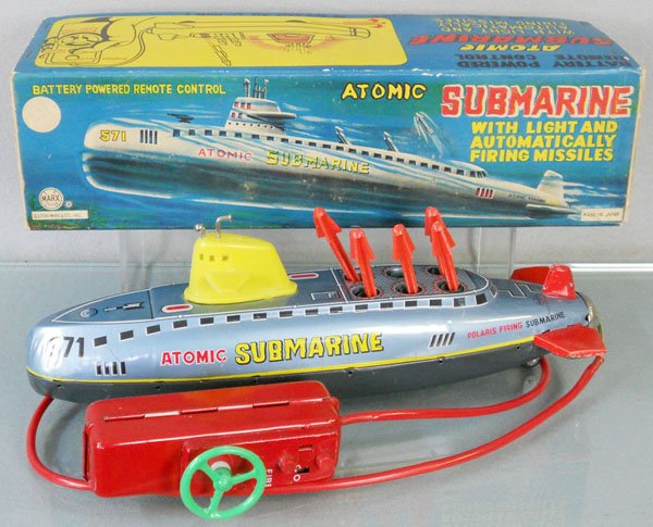 MARX ATOMIC SUBMARINE: litho tin & plastic, 13" long, battery operated, not working, missing 1 missile, orig box & insert, C8.