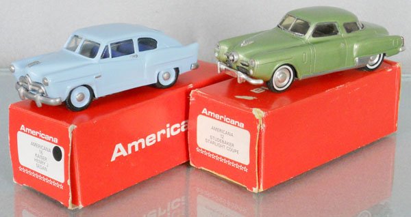 2 AMERICANA VEHICLES: white metal, Kaiser Henry J Sedan, tires have flat spots, Studebaker Starlight Coupe, interior loose, missing 1 doorhandle, orig boxes minor wear, C9.