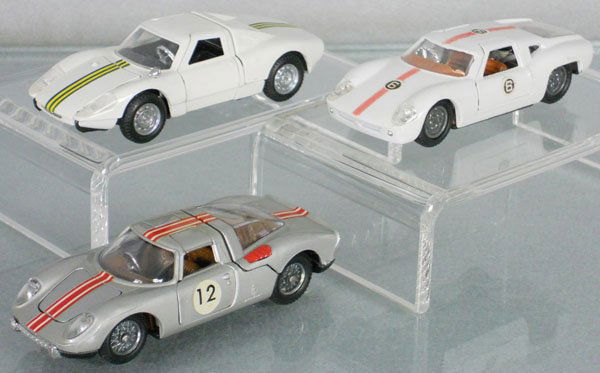 3 POLITOYS RACERS: 535 Porsche, 534 Lola GT, 525 Ferrari, C7-8.