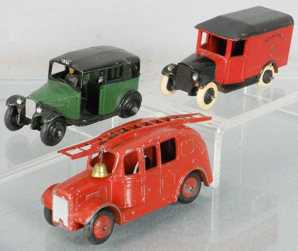 3 DINKY VEHICLES: 36G Taxi, 34B Royal Mail, 25H Fire Engine, all have flat spots on tires, C5.