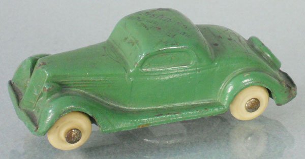 FORD 1935 COUPE PROMO: rubber, 4" long, rubberstamped on roof "Brewster - MOT Super Service Station Herron", rubberstamping worn, C6.