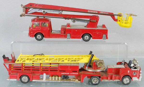 2 CORGI FIRE ENGINES: 1143 American LaFrance Hook & Ladder, missing 2 firemen, 1127 Simon Snorkel, plastic bucket missing handrails, C6.