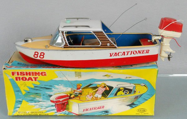 PLAYTHING FISHING BOAT: litho tin, 13" long, battery operated, not tested, plastic outboard motor has a crack, orig box & inserts worn, C7-8.