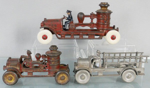3 KENTON FIRE TRUCKS: painted cast iron, Pumper, 9" long, Pumper, 6 1/4" long, Ladder Truck, 7 1/2" long, repainted, C3-5.