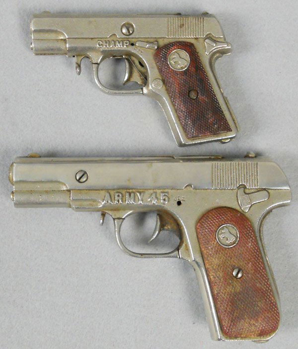 2 HUBLEY CAP PISTOLS: cast iron, Champ, 5" long, Army 45, 6 1/2" long, C5.